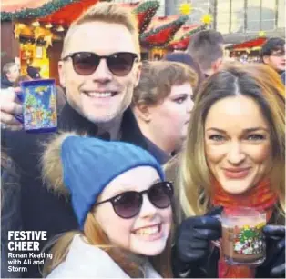  ??  ?? FESTIVE CHEER Ronan Keating with Ali and Storm