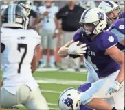  ??  ?? Darlington’s Kolin Rogers makes his way through the middle of the Coosa defense during Friday’s game at Chris Hunter Stadium.