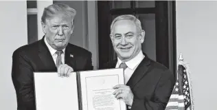  ?? Jacquelyn Martin / Associated Press ?? President Donald Trump and Israeli Prime Minister Benjamin Netanyahu are doing something no American president and Israeli prime minister have done before: They’re making support for Israel a wedge issue in American politics.