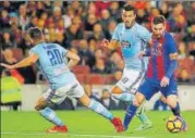  ?? AP PHOTO ?? Lionel Messi (right) scored twice as Barcelona demolished Celta Vigo 50 at the Nou Camp on Saturday.