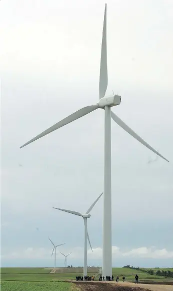  ?? BRYAN SCHLOSSER ?? The giant wind turbines that make up the Centennial Wind Power Project stand in the farmland near Swift Current. The province has approved a new wind energy project for the area south of Herbert.