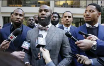  ?? RICHARD DREW — THE ASSOCIATED PRESS ?? Retired NFL player Anquan Boldin, left, and Eagles safety Malcolm Jenkins, center, found themselves shocked by a schism in the players coalition they’ve helped lead in recent weeks. San Francisco linebacker Eric Reid, to the right of this photo outside...