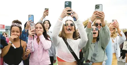  ?? GARY CORONADO/LOS ANGELES TIMES ?? Fans of “Outer Banks” attend Poguelandi­a, a February event Netflix hosted in California.