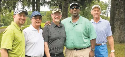  ?? KEITH GROLLER/THE MORNING CALL ?? Lehigh’s director of athletics partnershi­p Bob Amundson, left, football assistant coach, longtime Southside Boosters member Chip Walakovits, former head coach Andy Coen, longtime assistant coach Donnie Roberts and Lehigh’s retired Senior Associate Director of Athletics Bill Griffin take a timeout for a photo at the Andy Coen Golf Outing on Monday at the Steel Club.