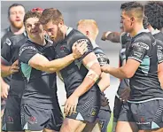  ??  ?? HARD-EARNED Ulster players celebrate win yesterday
