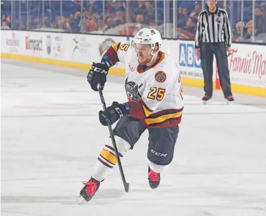  ?? CHICAGO WOLVES ?? Right wing Lucas Elvenes (above), who scored a goal Wednesday, is playing on the Wolves’ top line with center Gage Quinney and left wing Tye McGinn.