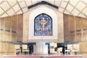  ?? [OKLAHOMAN ARCHIVES PHOTO] ?? A prominent stained glass window and stone interior at First Presbyteri­an Church of Edmond make it a popular draw for large weddings.