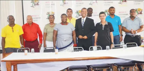  ??  ?? Re-elected AAG President, Aubrey Hutson is all smiles as he poses with the Executive and Committee Members following the AGM yesterday at the National Resource Centre.