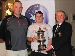  ??  ?? Profession­al Scott Kirkpatric­k (sponsor) and club captain Bryan Collins present the 2018 Laytown &amp; Bettystown Senior Scratch Cup to winner Caolan Rafferty (Dundalk/Maynooth University). Picture: Joe Ryan