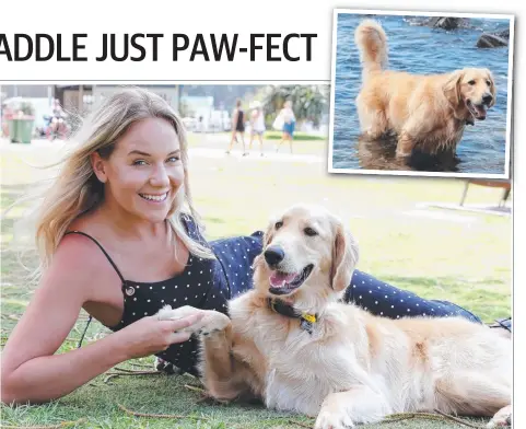  ?? Picture: MIKE BATTERHAM ?? Ellen Thomas with her pet dog Gary, who loves splashing about in the water.