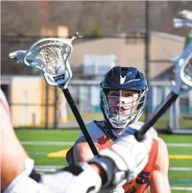  ?? MATT BUTTON/BALTIMORE SUN MEDIA ?? Bel Air senior lacrosse player Jake Harris zeroes in on the opposition at practice on March 30 at Bel Air High School’s Bobcat Stadium.