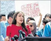  ?? CHRIST CHAVEZ/GETTY ?? Rep. Alexandria Ocasio-Cortez, D-N.Y. talks to reporters after touring the Clint, Texas, Border Patrol facility.