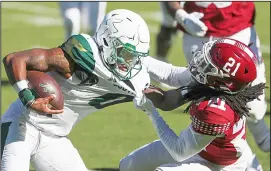  ??  ?? South Florida quarterbac­k Noah Johnson (0) is brought down by Temple cornerback Freddie Johnson (21) in the second half of an NCAA college football game at Lincoln Financial Field in
Philadelph­ia, on Oct 17. (AP)