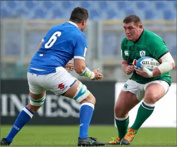  ??  ?? Tadhg Furlong taking on Italy’s Sebastian Negri in Rome on Saturday.