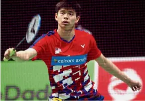  ??  ?? Creditable show: Malaysia’s Leong Jun Hao in action against Adel Hamek of Algeria. Debutant Jun Hao won 21-13, 21-8.