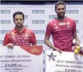  ??  ?? Parupalli Kashyap (left) and H.S. Prannoy pose at the presentati­on ceremony of the $120,000 US Open Grand Prix Gold in Anaheim, California.