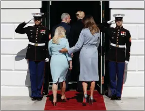  ?? AP/EVAN VUCCI ?? President Donald Trump and first lady Melania Trump greet Israeli Prime Minister Benjamin Netanyahu and his wife Sara as they arrive at the White House on Monday in Washington.