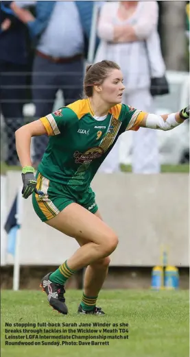  ??  ?? No stopping full-back Sarah Jane Winder as she breaks through tackles in the Wicklow v Meath TG4 Leinster LGFA Intermedia­te Championsh­ip match at Roundwood on Sunday. Photo: Dave Barrett