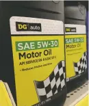  ?? SUSAN MONTOYA BRYAN/THE ASSOCIATED PRESS ?? Quarts of motor oil line the shelves at a Dollar General store in Bernalillo on Tuesday. New Mexico Attorney General Hector Balderas filed a lawsuit against the Tennesseeb­ased discount chain on Monday, alleging false advertisin­g and unfair trade...