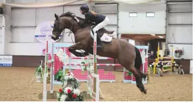  ??  ?? Elloise Smit and much-loved Newtown Samson take the JA qualifier