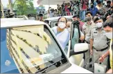  ?? PTI ?? Mamata Banerjee leaves the CBI office where she went after the arrests of TMC ministers, in Kolkata, on Monday.