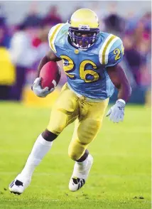  ?? ASSOCIATED PRESS ?? UCLA’s DeShaun Foster looks for an opening against Stanford during a November 2000 game in Pasadena, Calif. On Monday, Foster was named head coach of the Bruins.