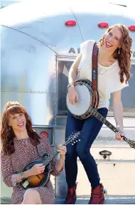  ?? Submitted photo ?? Katy Lou Clark and her sister Penny Lea Clark are The Purple Hulls, playing country, gospel and bluegrass music. The duo plays Saturday at Historic Washington State Park.