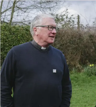  ??  ?? Flying the flag: Reverend Michael Cavanagh and Senator Mark Daly will continue the work of the Thomas F. Meagher Foundation