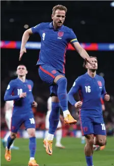  ?? GETTy IMAGES FILE ?? BRING ON THE THREE LIONS: Harry Kane celebrates scoring a penalty during the second half of England’s 2-1 win over Switzerlan­d in a friendly on March 26 at Wembley. The U.S. will face the Three Lions for the third time in the World Cup on Nov. 25 in Qatar.