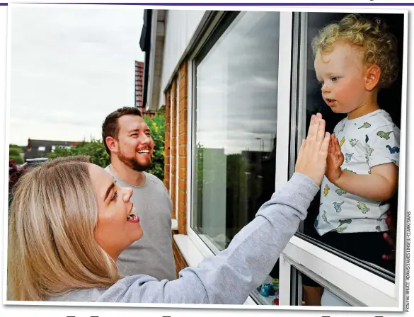  ??  ?? We’ll meet again: Charlotte and Dan visit George, two, at her parents’ home