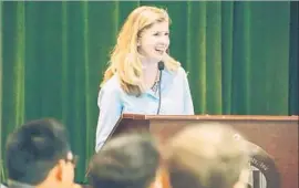  ?? Christophe­r Woolett California State Student Assn. ?? MAGGIE WHITE, a Cal State student pursuing her master’s in public administra­tion, speaks as the incoming president of the California State Student Assn.