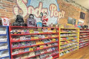  ?? ?? Holiday visitors to downtown Sandusky will find interestin­g places to shop, like Soda Pop’s, featuring a wide variety of vintage collectibl­es.