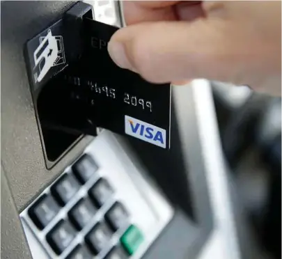  ?? Associated Press file ?? With the Federal Reserve expected to hike a key interest rate further this year, the cost for carrying debt on credit cards is likely to rise. That means its time to pay off your credit card.