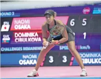  ?? AP ?? Naomi Osaka plays a shot against Dominika Cibulkova. —