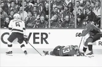  ?? ALEX BRANDON THE ASSOCIATED PRESS ?? Capitals right-winger Tom Wilson lies on the ice after a hit by Tampa Bay Lightning defenceman
Anton Stralman in Game 3 of their NHL Eastern Conference final playoff series Tuesday night in Washington.