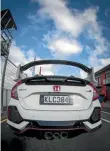  ??  ?? The big rear wing is a statement piece of the new Honda Civic Type R.