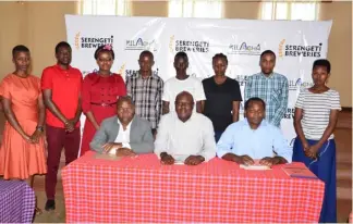 ??  ?? SBL MD Mark Ocitti (sitting centre) in a group photo with management of Kilacha Agricultur­e and Livestock Training Center and students who are beneficiri­es of Kilimo Viwanda Agro-scholarshi­p program in Feb 2020