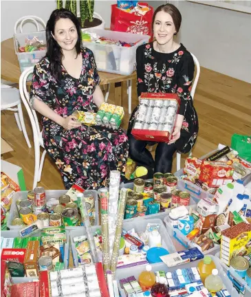  ??  ?? Right: A connection made through social media helped local women Gemma Torney and Rebecca Little collect a dining room full of non-perishable food items for Baw Baw Combined Churches Food Relief.