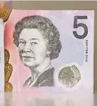  ?? REUTERS PIC ?? The A$5 note with the portrait of the late Queen Elizabeth II will be replaced with a new design.