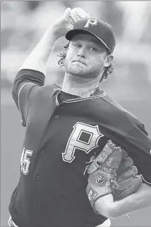  ?? Justin K. Aller Getty Images ?? GERRIT COLE has given the Pittsburgh Pirates a big boost since arriving in the big leagues ahead of schedule in the summer.