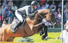  ?? GAVIN YOUNG ?? Germany’s Philipp Weishaupt and Sansibar 89 won the Cana Cup on Day 2 at the Spruce Meadows Masters on Thursday afternoon.