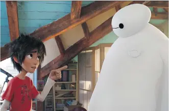  ?? THE ASSOCIATED PRESS/ DISNEY ?? Animated characters Hiro Hamada, voiced by Ryan Potter, left, and Baymax, voiced by Scott Adsit, in a scene from Big Hero 6, Disney’s latest release.
