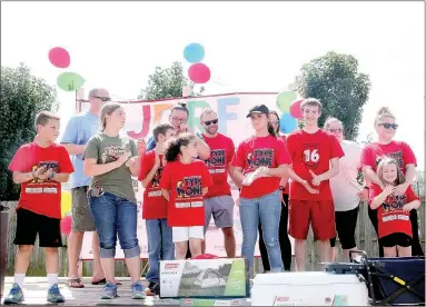  ?? LYNN KUTTER ENTERPRISE-LEADER ?? All with Type 1 diabetes, children and adults, were invited to the stage Saturday to release balloons to signify a world without Type 1 diabetes. Farmington School District has six students living with Type 1 diabetes, a life-long chronic disease.