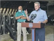  ??  ?? Pennsylvan­ia Department of Agricultur­e Secretary Russell Redding speaks during a press conference at Scattered Acres dairy farm in Bern Township on Aug. 21. Redding announced the first round of payments to be made to dairy farmers through the Pennsylvan­ia COVID-19 Dairy Indemnity Program, part of the $40 million CARES Act.