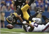  ?? JOSHUA BESSEX — THE ASSOCIATED PRESS ?? Pittsburgh Steelers cornerback Tre Norwood (21) breaks up a pass intended for Buffalo Bills wide receiver Gabriel Davis (13) during the second half Sunday in Orchard Park, N.Y.