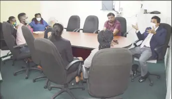  ??  ?? Minister of Legal Affairs Anil Nandlall (right) speaking to the programme staff (Ministry of Legal Affairs photo)