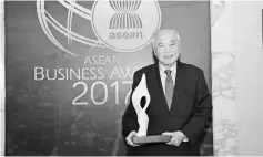  ??  ?? Dr Wee poses with the Asean Business Awards Legacy Award (Singapore) recently.