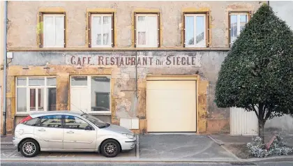  ?? Photo / AP ?? Thousands of cafes across France, including in Pontcharra-sur-Turdine, have closed over the years.