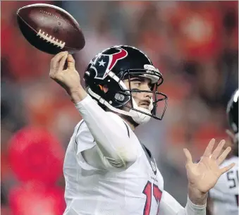  ?? JOE MAHONEY/THE ASSOCIATED PRESS ?? Houston Texans quarterbac­k Brock Osweiler bobbles a throw during Monday’s game against the Denver Broncos. The contest capped a string of three poor prime-time games for the league, which is seeing its TV ratings decline because of it.