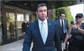  ?? DENIS POROY — THE ASSOCIATED PRESS ?? In this Monday, July 1, 2019, file photo, U.S. Rep. Duncan Hunter leaves federal court after a motions hearing in San Diego. On Tuesday, Dec. 22, 2020, President Donald Trump pardoned 15 people, including Hunter, who was sentenced to 11 months in prison after pleading guilty to stealing campaign funds and spending the money on everything from outings with friends to his daughter’s birthday party.